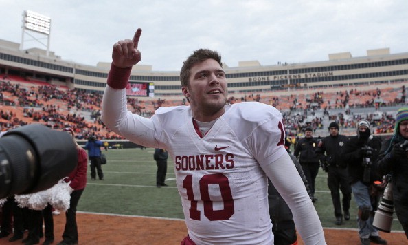 STILLWATER OK- DECEMBER 7  Quarterback Blake Bell #10 of the Oklahoma Sooners walks off the field after the game against the Oklahoma State Cowboys