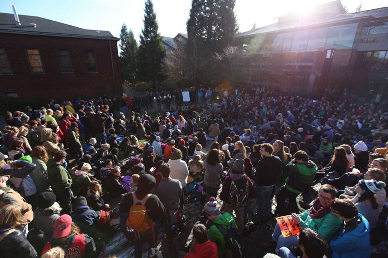 COURTESY OF KAI WARD- Lewis & Clark students sat for hours outside J.R. Howard Hall and the Watzek Library on campus to protest racial Yik Yak posts that popped up shortly after the college's annual symposium on race and ethnic studies