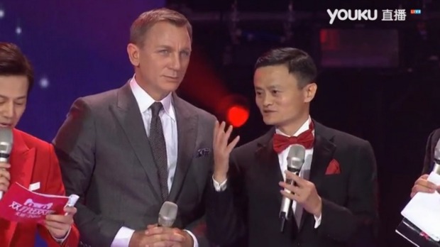 James Bond actor Daniel Craig left attends the extravagant live television Singles Day gala launched by billionaire Alibaba founder Jack Ma right