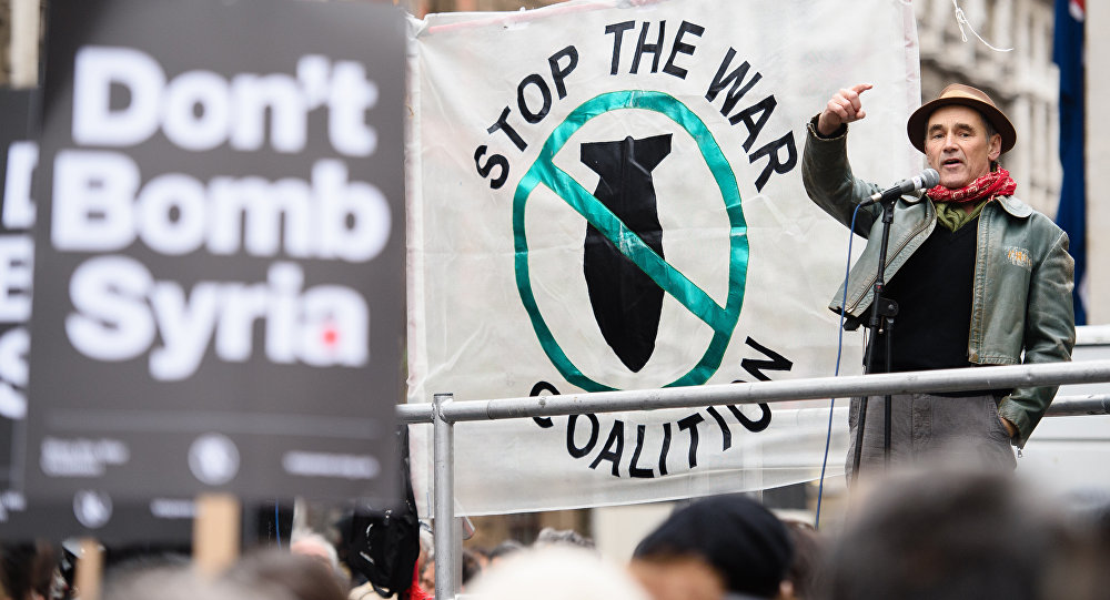 Thousands Rally in London Against Cameron's Plan to Bomb Syria     
    AFP 2015 LEON NEAL