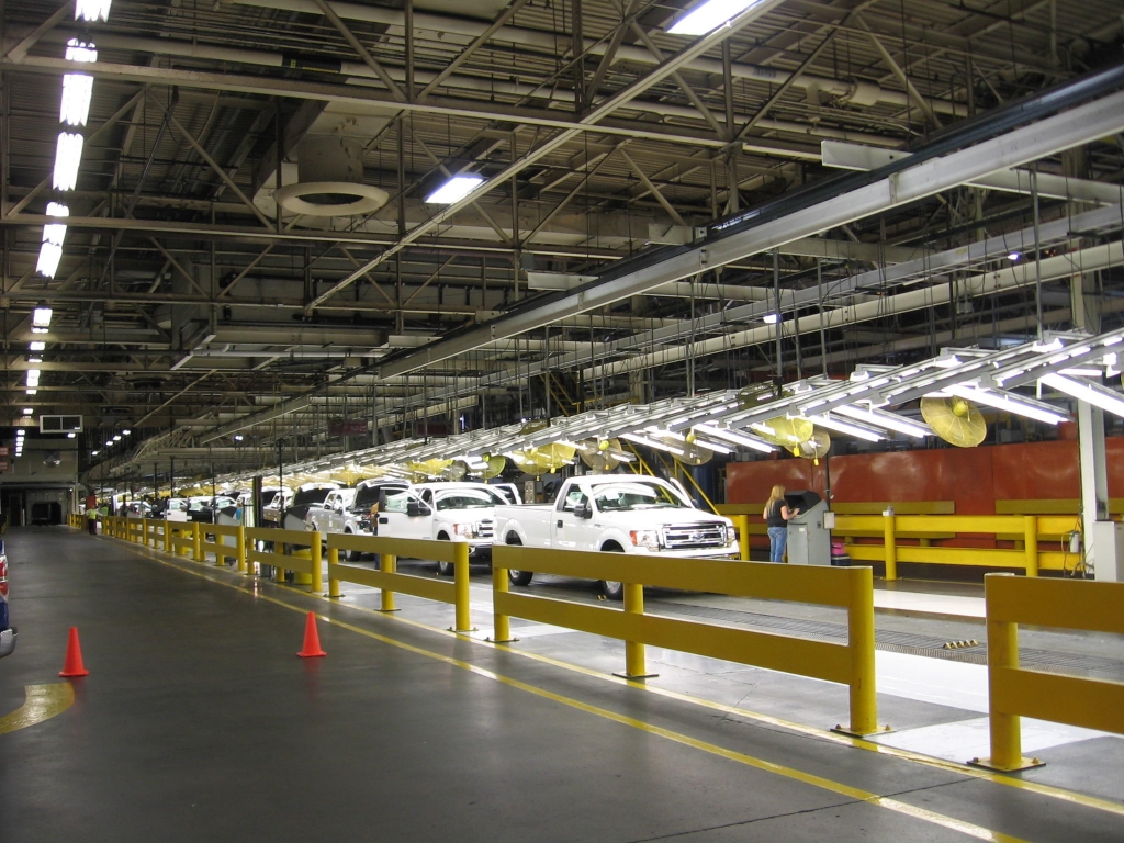 Ford F-150s roll out of an assembly line at the Claycomo Plant