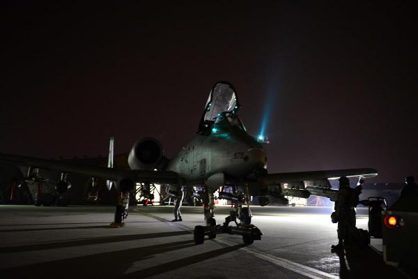 Members of the 25th Fighter Squadron ready A-10 Thunderbolt IIs for night operations during the first night of the exercise Vigilant Ace 16 at Osan Air Base Republic of Korea Nov. 2 2015