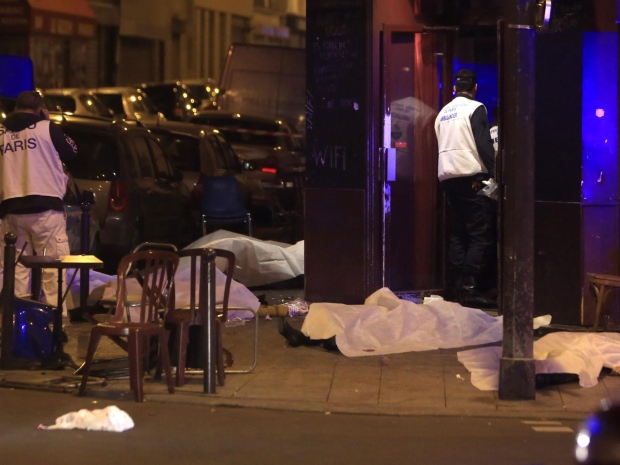 Victims lay on the pavement in a Paris restaurant Friday Nov. 13 2015