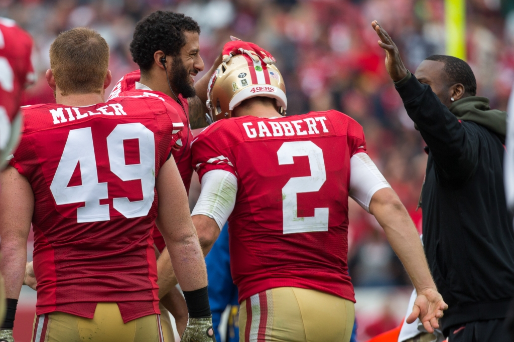 Santa Clara CA USA San Francisco 49ers quarterback Colin Kaepernick congratulates quarterback Blaine Gabbert after a touchdown pass during the second quarter against the Atlanta Falcons at Levi's Stadium. The 49ers defeated