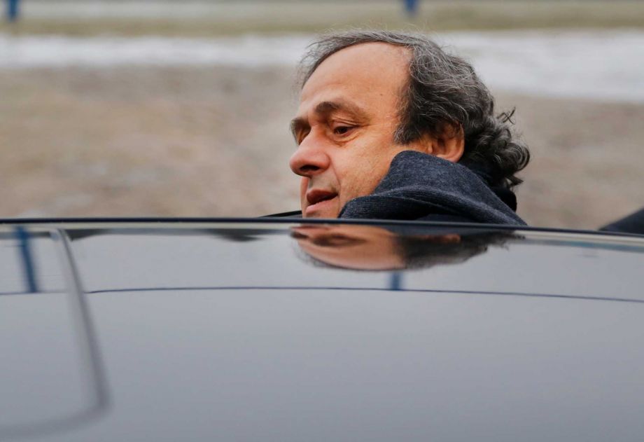 Platini gets into a car after a visit to the football arena in Minsk Belarus. Sepp Blatter and Michel Platini have been banned for 8 years the FIFA ethics committee said Monday Dec. 21 201