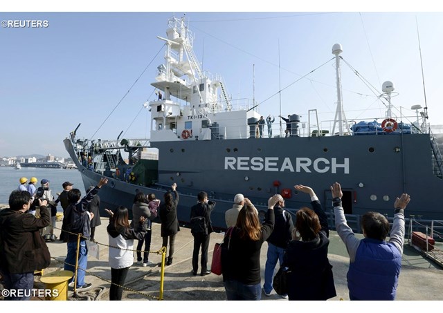 Families of crew members wave as Japanese whaling vessel Yushin Maru sets sail for the Antarctic Ocean- REUTERS