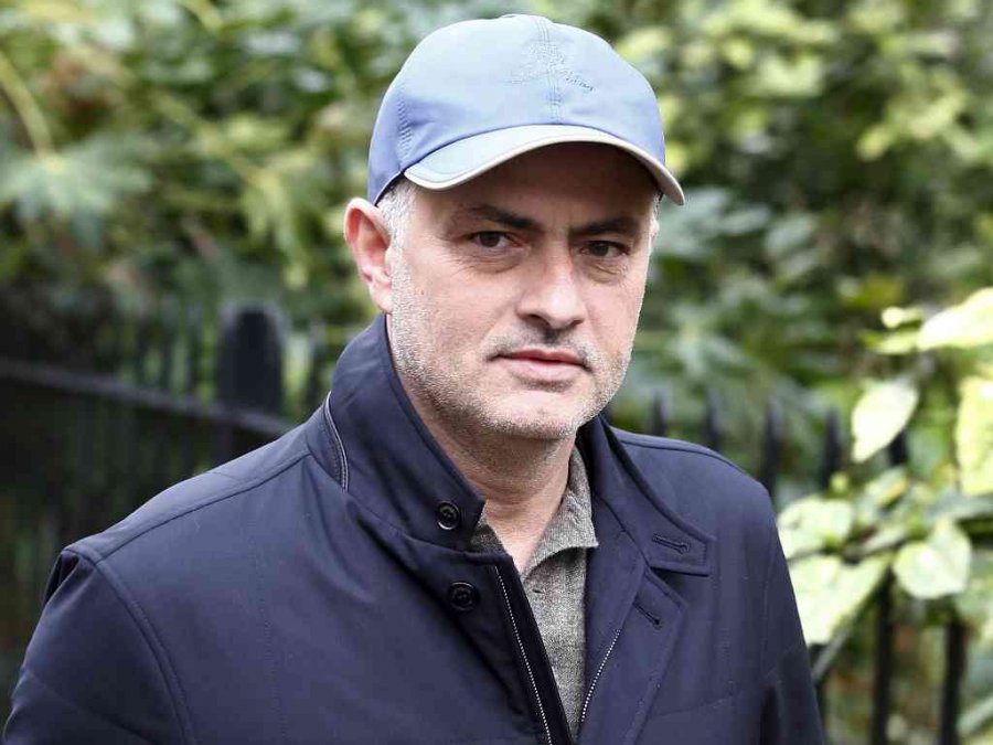 Former Chelsea soccer club manager Jose Mourinho walks near to his home in London Britain