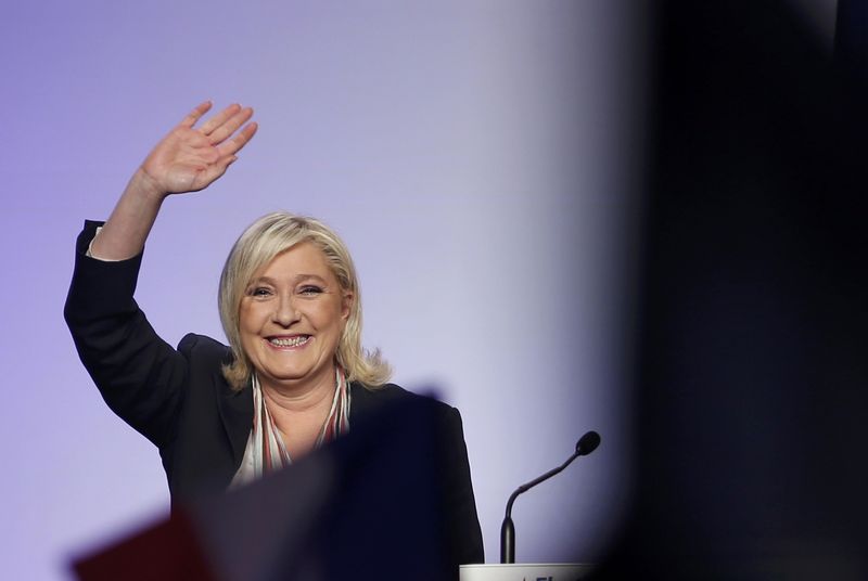 Marine Le Pen French National Front political party leader arrives to attend a political rally as she campaigns for the upcoming regional elections in Paris France. – Reuters pic