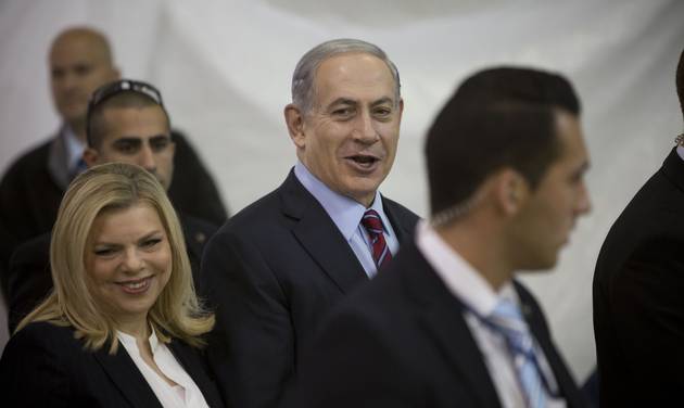 Israeli Prime Minister Benjamin Netanyahu and his wife Sarah arrive for the Likud party primary elections in Jerusalem Israel’s first canine is in the dog house after biting two guests at the Prime Min