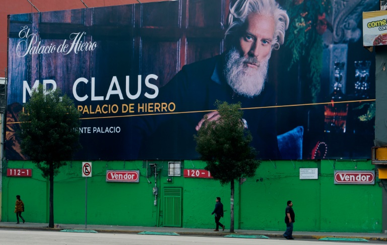 AFP  Omar TorresA billboard of a Mexican department store advertises Mr. Claus for the Christmas season