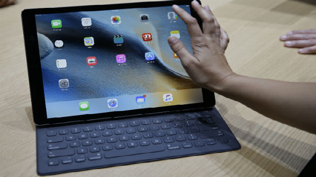 The new iPad Pro is seen with a Smart Keyboard during a product display following an Apple event Wednesday Sept. 9 2015 in San Francisco