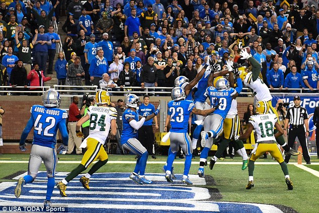 Green Bay Packers tight end Richard Rogers makes a last-second catch to win the game