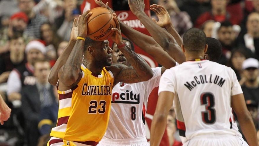 Dec 26 2015 Portland OR USA Portland Trail Blazers forward Al Farouq Aminu defends Cleveland Cavaliers forward Le Bron James at Moda Center at the Rose Quarter. Mandatory Credit Jaime Valdez-USA TODAY Sports