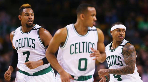 Jared Sullinger #7 of the Boston Celtics Avery Bradley #0 and Isaiah Thomas #4 of the Boston Celtics