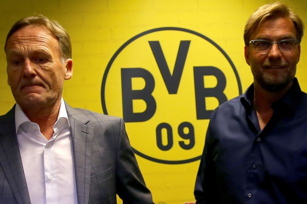 Hans Joachim Watzke chairman of the board and head coach Juergen Klopp attend a press conference