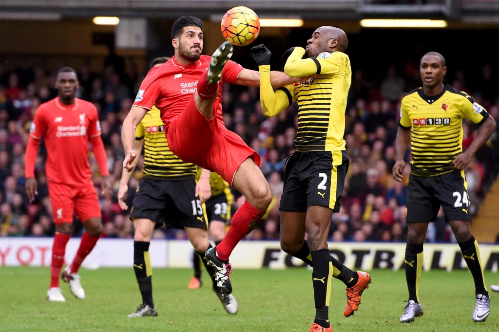 Liverpool's Emre Can battles for the ball with Watford's Allan Nyom