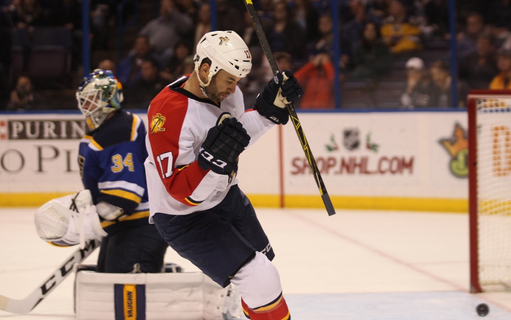 Florida Panthers Derek Mackenzie pumps his fist after scoring a goal past St. Louis Blues goaltender Jake Allen in the second period at the Scottrade Center in St. Louis