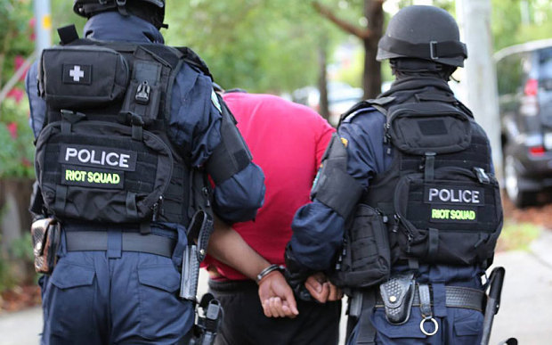 Two men arrested in counter-terrorism raids in Sydney suburbs of Merrylands