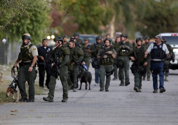 Authorities search for a suspect following a shooting that killed multiple people at a social services facility Wednesday Dec. 2 2015 in San Bernardino Calif