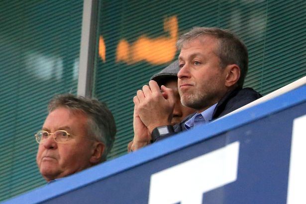 Chelsea interim manager Guus Hiddink in the stands with Didier Drogba and club owner Roman Abramovich