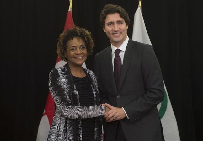 Canadian Prime Minister Justin Trudeau and Secretary General of the Francophonie Michaelle Jean speak at the start of a bilateral meeting before the United Nations climate change summit in Paris France on Sunday Nov. 29 2015. THE CANADIAN PRESS  Adrian