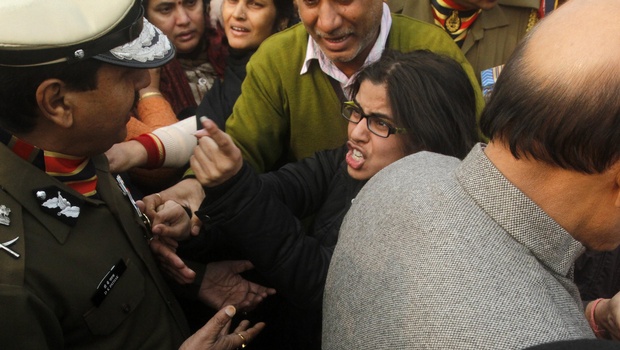 BSF Director General DK Pathak tries to calm a family member of one of the plane crash victims at Safdarjung airport New Delhi | Shekhar Yadav