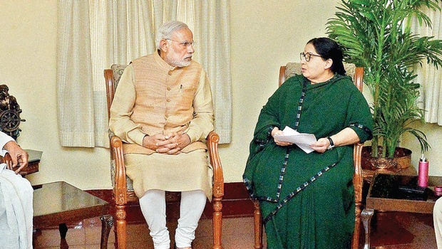 Chief Minister J Jayalalithaa briefing PM Modi on the flood situation in Chennai on Thursday  PM’s aerial survey | PTI