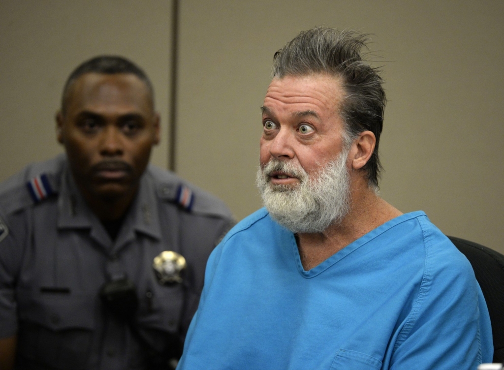 Robert Lewis Dear talks to Judge Gilbert Martinez during a court appearance on Wednesday Dec. 9 2015 in Colorado Springs Colo. Dear accused of killing three people and wounding nine others at a Colorado Springs Planned Parenthood clinic on Nov. 27