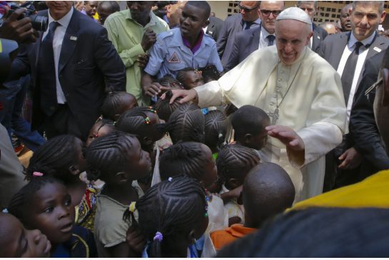 Pope Francis blesses children during his visit at a refugee camp in Bangui Central African Republic on Sunday