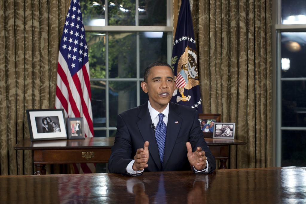 President Obama delivering his first Oval Office address at the White House