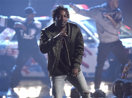 Kendrick Lamar performs at the BET Awards at the Microsoft Theater in Los Angeles. Lamar Taylor Swift and the Weeknd have earned top nominations for the 2016 Grammy Awards including album of the year. (P