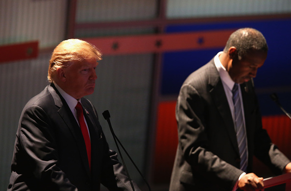 MILWAUKEE WI- NOVEMBER 10 Presidential candidate Donald Trump and Ben Carson pause during a commerical break at the the Republican Presidential Debate sponsored by Fox Business and the Wall Street Journal at the Milwaukee Theatre