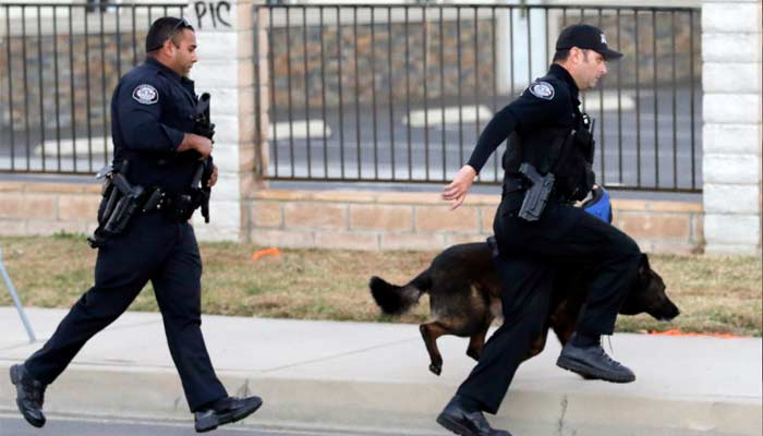 Authorities search for a suspect following a shooting that killed multiple people at a social services facility Wednesday Dec. 2 2015 in San Bernardino Calif