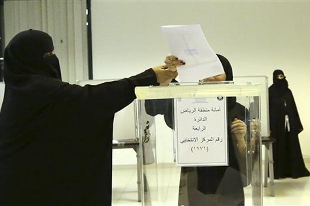 Saudi women vote at a polling center during municipal elections in Riyadh Saudi Arabia on Saturday