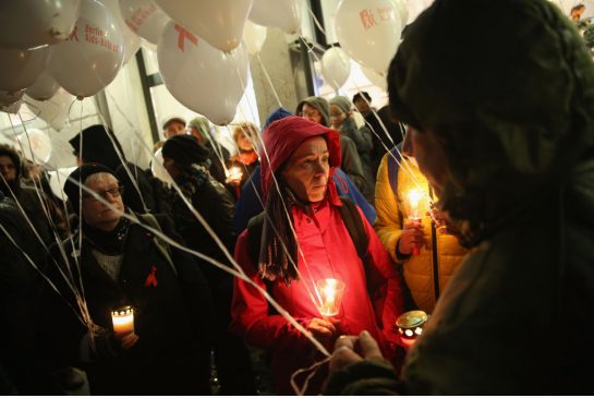 Members of Berlin's gay community prepare to commemorate AIDS victims Monday