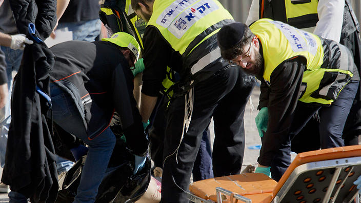 Two Palestinians have gone on a stabbing spree along a popular walkway in Jerusalem