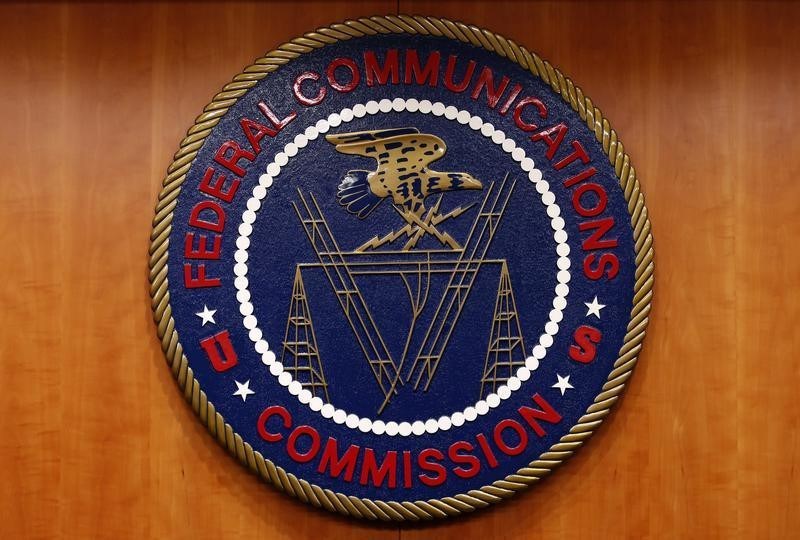 The Federal Communications Commission logo is seen before the FCC Net Neutrality hearing in Washingt