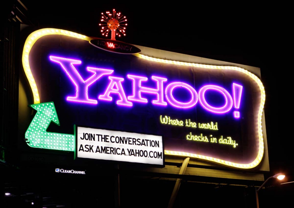 Yahoo signboard is displayed in San Francisco. Shares of Yahoo are up sharply before the opening bell Wednesday Dec. 2 2015 on a report that the company will discuss the sale of its Internet business