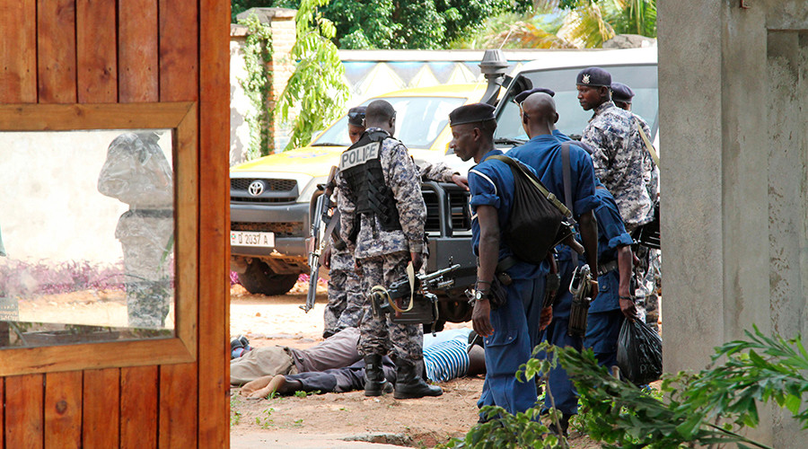 Burundian military and police frisk suspects after they recovered a cache of ammunitions recovered from combatants near Lake Tanganyika in the capital Bujumbura