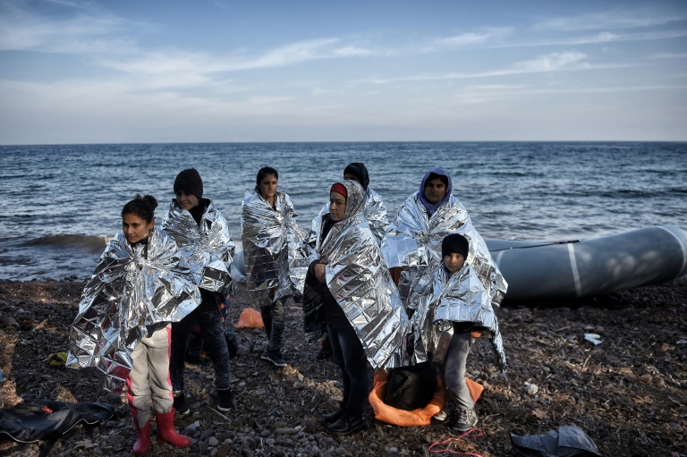 AFP  Aris Messinis Refugees and migrants arrive on the island of Lesbos after crossing the Aegean sea from Turkey