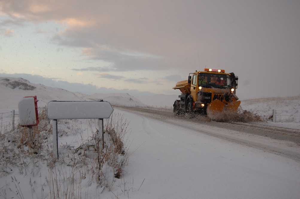 A snow plough in action two winters ago. The Met Office is forecasting 5-10cm of snowfall overnight