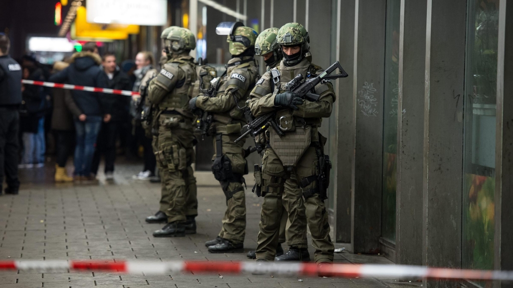 Armed German police on duty at the main railway station in central Munich Germany 31 December 2015