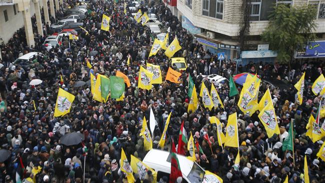 Mourners attend the funeral of Palestinians killed by Israeli forces in the occupied West Bank city of al Khalil