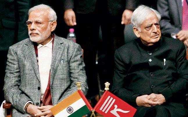 Both flags were used at the oath-taking ceremony of J&K CM Mufti Muhammad Sayeed. PM Modi was also present