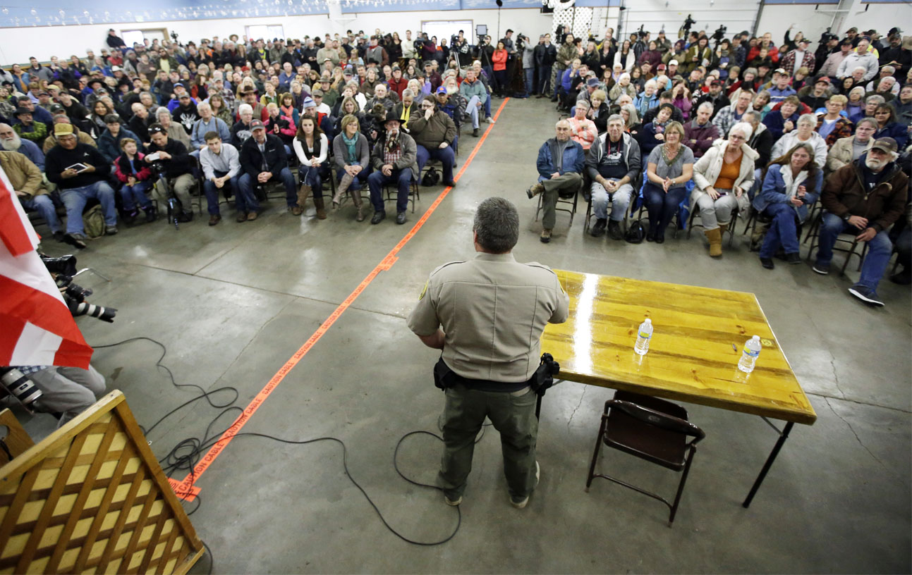 Harney County Sheriff David Ward listens to concerns during a community meeting at the Harney County fairgrounds on Wednesday Jan. 6 2016 in Burns Ore. The leader of an American Indian tribe that regards an Oregon nature preserve as sacred issued a