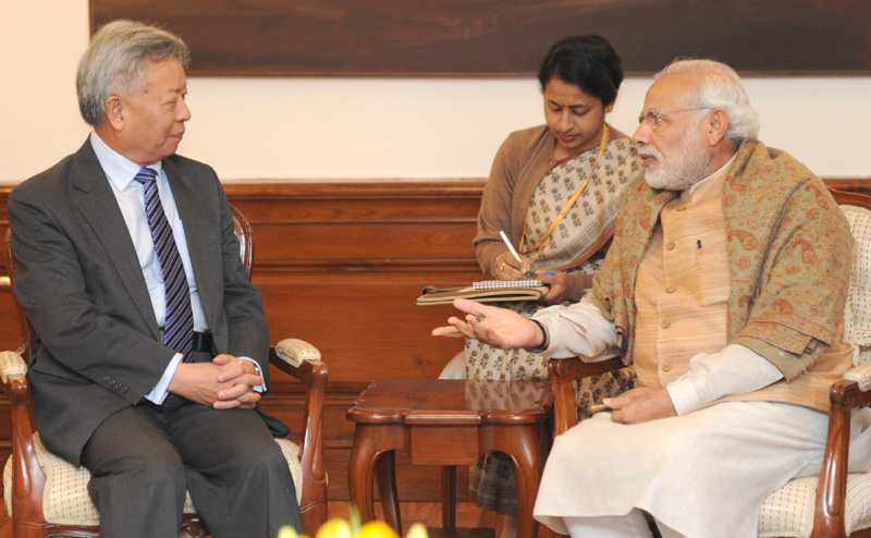 The President Designate of Asian Infrastructure Investment Bank, Mr. Jin Liqun calls on the Prime Minister Mr. Narendra Modi in New Delhi