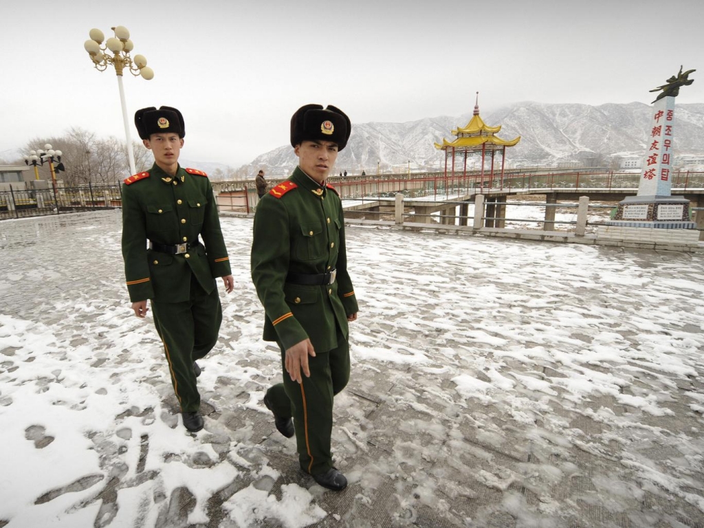 Chinese border guards patrol the Tumen river on the border with North Korea