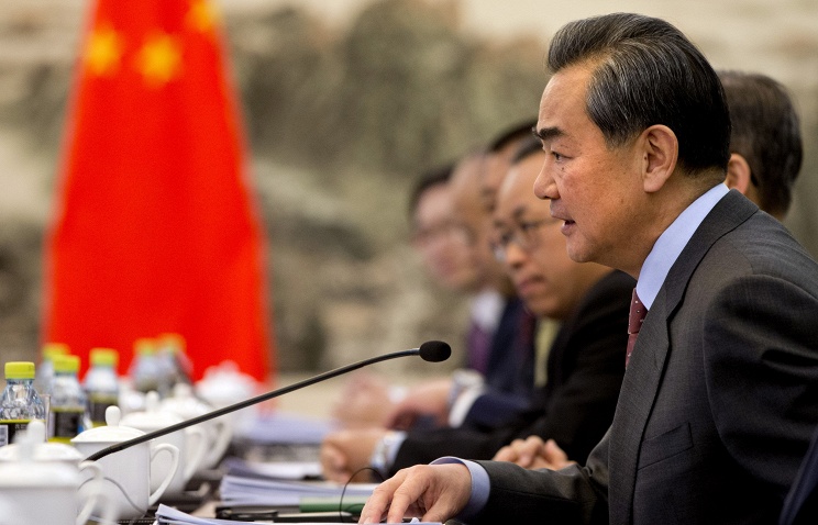 Chinese Foreign Minister Wang Yi at the meeting with US Secretary of State John Kerry