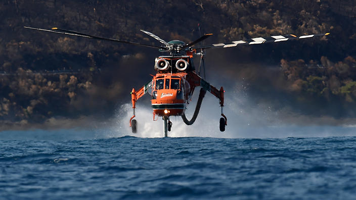 Cooler conditions have brought some relief for fire crew who continue fighting a blaze in Victoria