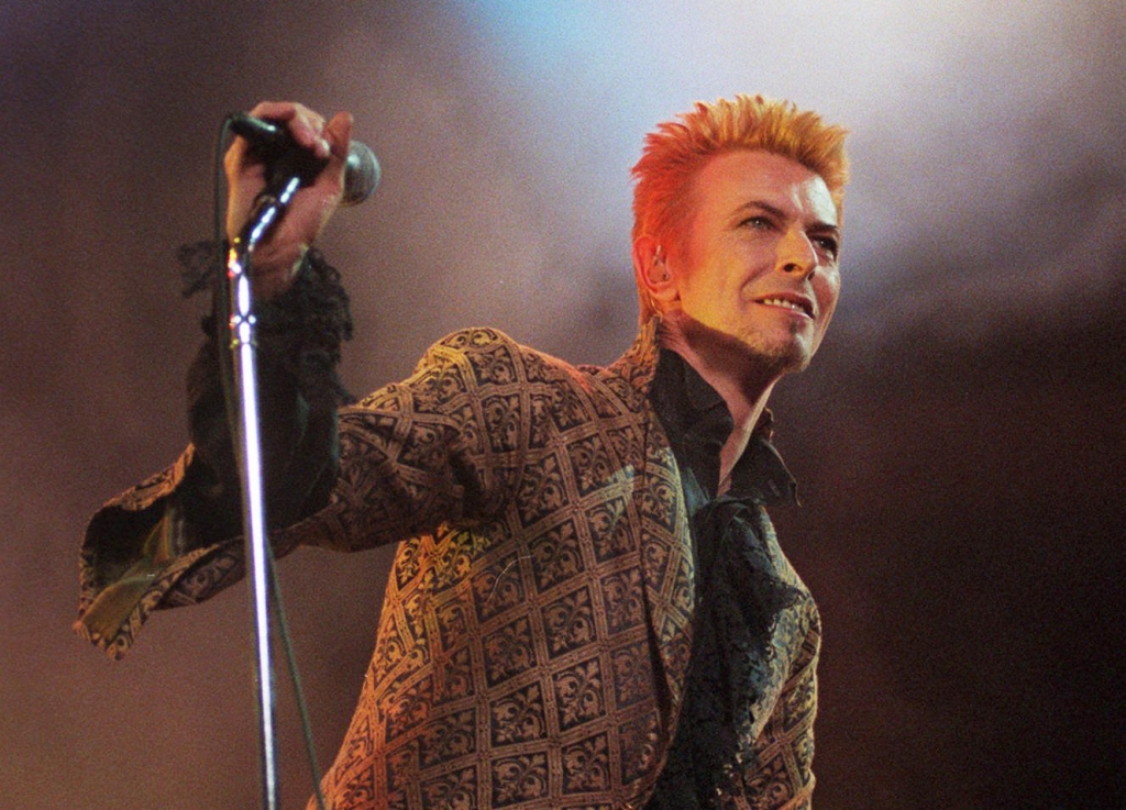 David Bowie performs during a concert celebrating his 50th birthday on Jan. 9 1997 at Madison Square Garden in New York City